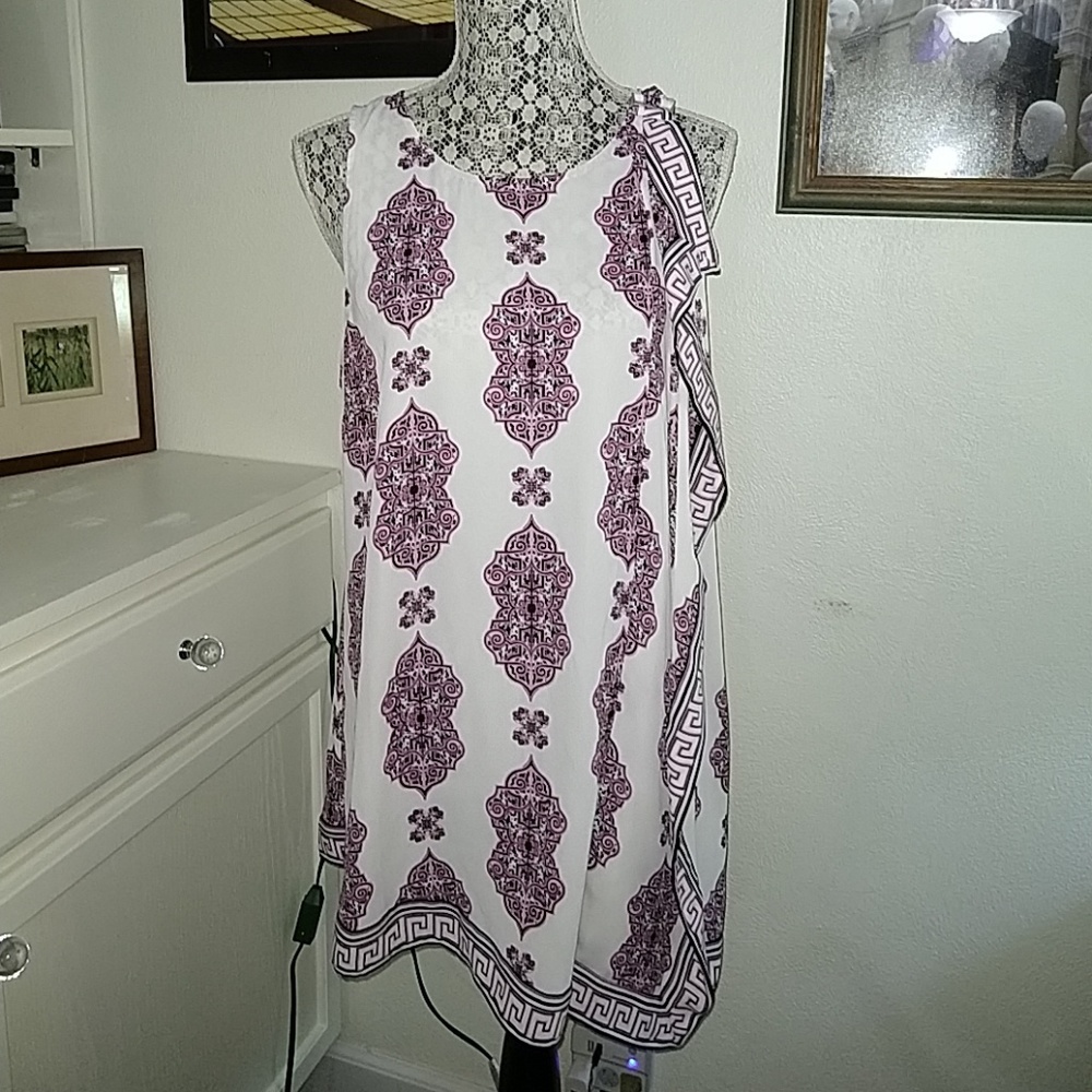 Asymmetrical sleeveless tunic